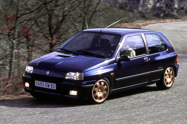 Blue Renault Clio on a country road