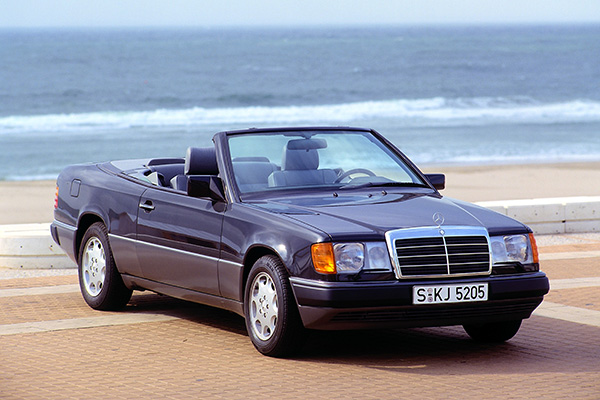 Black Mercedes CE Cabriolet convertible by the sea