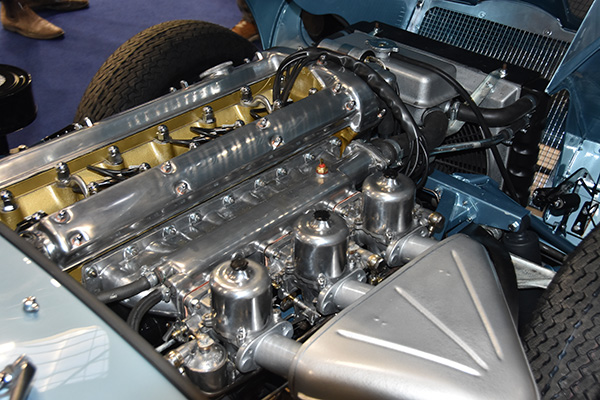 Opalescent silver blue Jaguar E Type engine at NEC show