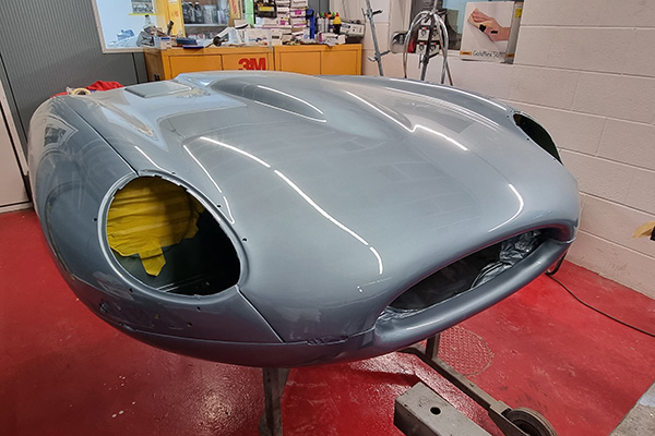 Opalescent silver Jaguar E Type bonnet chassis