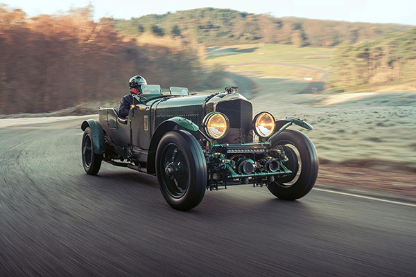 Racing Green Bentley Blower Jnr On A Hilly Country Road